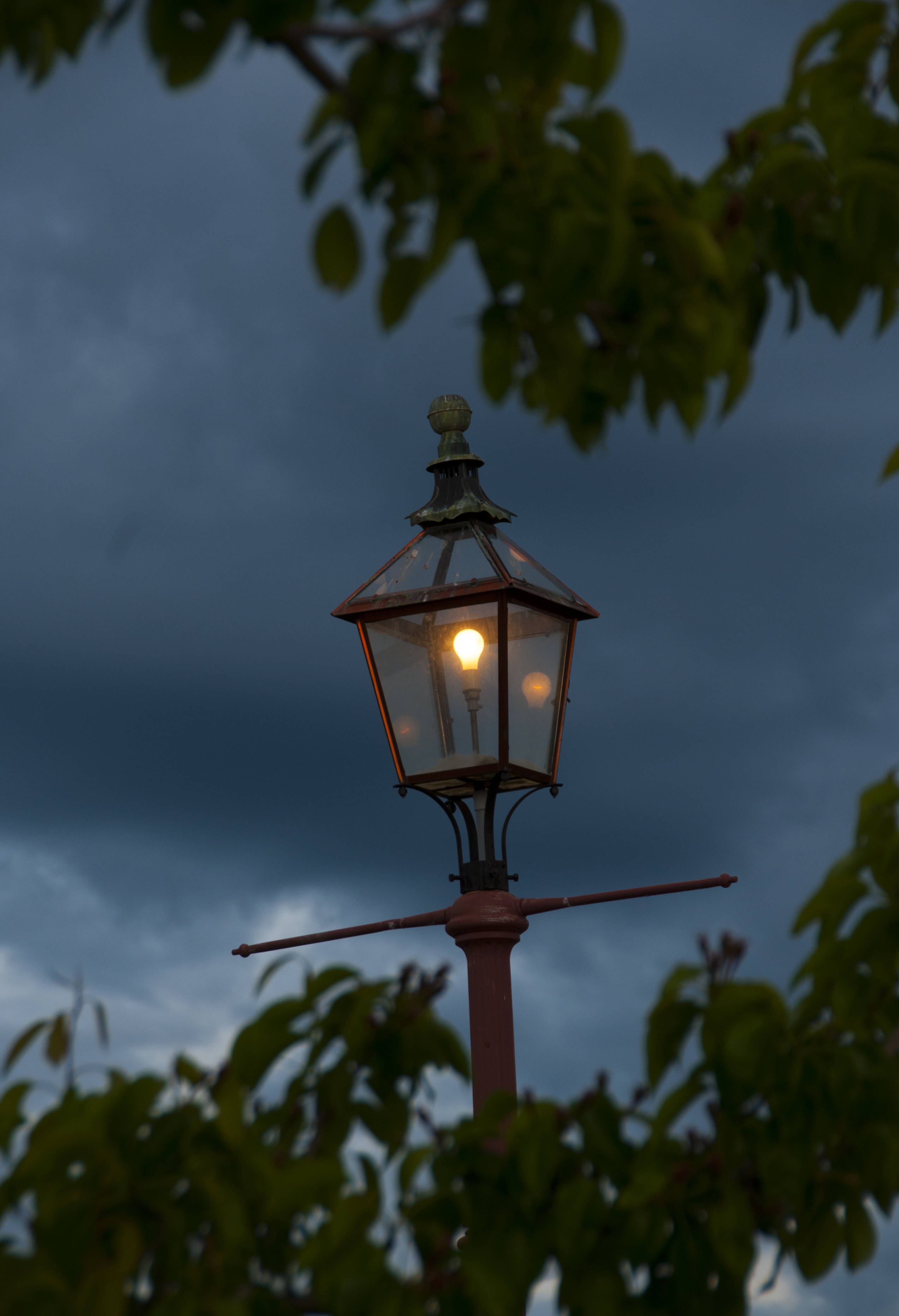 old-lantern-hang-on-the-wooden-pole-2024-09-16-22-13-52-utc.jpg